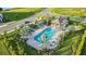 Community pool with cabanas and a relaxing atmosphere at 27460 Janzen Ct, Englewood, FL 34223
