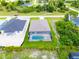 Home with pool and screened patio in a residential area at 196 Arch Dr, Rotonda West, FL 33947