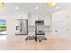 Stainless steel appliances and granite countertops in a modern kitchen at 196 Arch Dr, Rotonda West, FL 33947