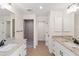 Modern bathroom with double vanity, granite countertop, and walk-in shower at 196 Arch Dr, Rotonda West, FL 33947