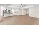 Modern kitchen with white cabinets, granite counters, and island at 196 Arch Dr, Rotonda West, FL 33947