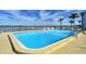 Clean and inviting community pool with water views at 771 John Ringling Blvd # 22Fair, Sarasota, FL 34236
