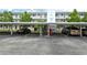 Covered parking area for residents with multiple parking spaces at 771 John Ringling Blvd # 22Fair, Sarasota, FL 34236