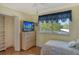 Small bedroom with a single bed and large closet at 771 John Ringling Blvd # 22Fair, Sarasota, FL 34236