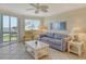 Living room with water views and comfortable seating at 771 John Ringling Blvd # 22Fair, Sarasota, FL 34236