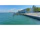 Stunning waterfront view of the building and marina at 771 John Ringling Blvd # 22Fair, Sarasota, FL 34236