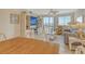 Relaxing living room with water views, fireplace, and ample seating at 771 John Ringling Blvd # 22Fair, Sarasota, FL 34236
