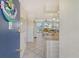 Inviting entryway with tiled floors and view into spacious living area at 771 John Ringling Blvd # 22Fair, Sarasota, FL 34236