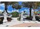 Statues and landscaping in a charming town square at 771 John Ringling Blvd # 22Fair, Sarasota, FL 34236