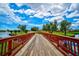Wooden footbridge over water feature at 4115 Putter Pl # 4115, Bradenton, FL 34203