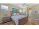 Comfortable bedroom with a king-size bed and plenty of natural light at 5050 Hanging Moss Ln, Sarasota, FL 34238