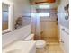 Clean bathroom with a shower/tub combo and white vanity at 7150 W Country Club N Dr, Sarasota, FL 34243