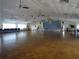 Large community hall with hardwood floors at 1834 Palm Springs St, Sarasota, FL 34234