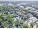 Aerial view of community tennis courts and pool at 5188 Marsh Field Ln # 93, Sarasota, FL 34235