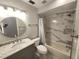 Updated bathroom with granite vanity and a tub shower combo at 5188 Marsh Field Ln # 93, Sarasota, FL 34235