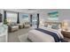 Relaxing main bedroom with a king-size bed and access to the patio at 5188 Marsh Field Ln # 93, Sarasota, FL 34235
