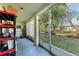 Enclosed patio showcasing a transition to an outdoor space, offering potential for relaxation and storage at 3514 Lake Bayshore Dr # K-108, Bradenton, FL 34205