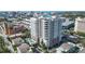 Aerial view of the high rise building with views of the city, and ocean at 1771 Ringling Blvd # 604, Sarasota, FL 34236
