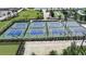 Aerial view of pickleball courts and surrounding community amenities at 16100 Old Fox Trl, Port Charlotte, FL 33953