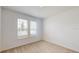Spacious bedroom with two windows and neutral carpet at 1575 Laurel Brook Ln, Port Charlotte, FL 33953