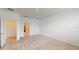 Spacious bedroom with carpeting and access to bathroom at 1575 Laurel Brook Ln, Port Charlotte, FL 33953