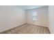 Bright bedroom with neutral-colored carpet and window blinds at 1575 Laurel Brook Ln, Port Charlotte, FL 33953