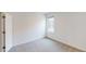 Simple bedroom with grey carpet and large closet at 16113 Old Fox Trl, Port Charlotte, FL 33953