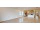 Spacious living area with light walls and hardwood floors at 16113 Old Fox Trl, Port Charlotte, FL 33953