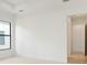Bedroom with a view and access to hallway at 524 Bocelli Dr, North Venice, FL 34275