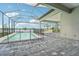 Enjoy this relaxing pool and patio area, perfect for entertaining at 524 Bocelli Dr, North Venice, FL 34275