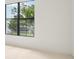 Bright bedroom with neutral walls and carpeting, featuring a large window at 524 Bocelli Dr, North Venice, FL 34275