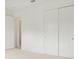Spacious bedroom with neutral walls, carpeting, and double door closet at 524 Bocelli Dr, North Venice, FL 34275