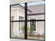 Window view of the home's exterior, showcasing the architectural details at 524 Bocelli Dr, North Venice, FL 34275