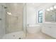 Spa-like bathroom with soaking tub and walk-in shower at 524 Bocelli Dr, North Venice, FL 34275