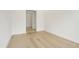Spacious bedroom with hardwood floors and access to hallway at 524 Bocelli Dr, North Venice, FL 34275