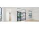 Bright living room with sliding glass doors opening to pool area at 524 Bocelli Dr, North Venice, FL 34275