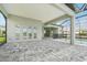 Covered patio with access to pool and backyard at 524 Bocelli Dr, North Venice, FL 34275
