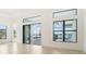 Bright living room with sliding glass doors opening to pool area at 524 Bocelli Dr, North Venice, FL 34275