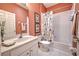 Bright bathroom showcasing a tub and shower combination with colorful accents at 8047 Victoria Falls Cir, Sarasota, FL 34243