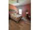 Serene bedroom with neutral tones, a comfortable bed, and bright window views at 8047 Victoria Falls Cir, Sarasota, FL 34243