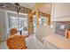 Charming breakfast nook area with views of the screened-in patio and lovely backyard at 8047 Victoria Falls Cir, Sarasota, FL 34243