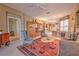 Spacious living room with a comfortable seating area, dining area, and natural light at 8047 Victoria Falls Cir, Sarasota, FL 34243
