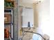 Efficient tankless water heater with digital display, installed in utility area at 8047 Victoria Falls Cir, Sarasota, FL 34243