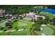 Aerial view of The Oaks Club, showing the clubhouse and golf course at 401 N Point Rd # 301, Osprey, FL 34229