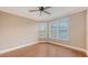 Bright bedroom featuring hardwood floors and large windows at 401 N Point Rd # 301, Osprey, FL 34229