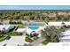 Community features a tennis court, pool, and lush landscaping at 5372 Pamela Wood Way # 7, Sarasota, FL 34233