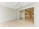 Enclosed patio with sliding glass doors leading to the kitchen at 5372 Pamela Wood Way # 7, Sarasota, FL 34233