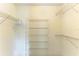 Large walk-in closet with wire shelving at 5372 Pamela Wood Way # 7, Sarasota, FL 34233