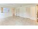 Spacious bedroom with tiled floors and double closets at 5372 Pamela Wood Way # 7, Sarasota, FL 34233