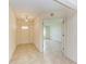 Bright entryway with tile floors and access to living room at 5372 Pamela Wood Way # 7, Sarasota, FL 34233